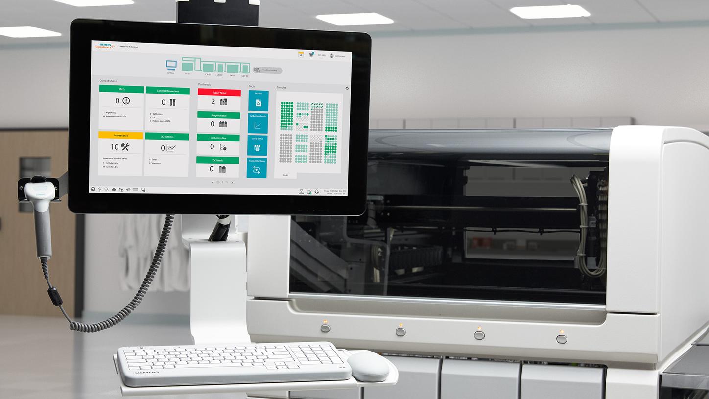 Atellica Solution touchscreen interface and analyzer in a laboratory